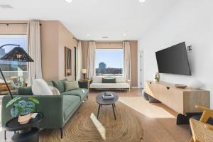 Penthouse Condo on River with Garage and Patio, Walk Downtown