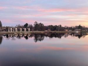 Bridge Inn Tomahahwk - 1st Floor, Room 106,1 King Bed, Pet Friendly, Laminate Wood Flooring, Walkout, River View, Price Includes 1 Pet Fee