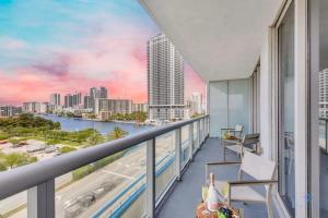 Sunset Oasis with 2BR, Balcony, Pool, Perfect Getaway