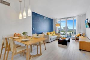 Sunset Oasis with 2BR, Balcony, Pool, Perfect Getaway