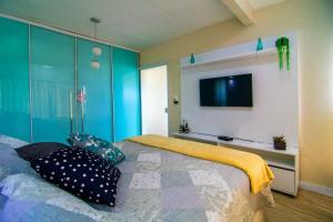 Casa cpiscina á 15 minutos Parque Beto Carreiro e 300m da praia Navegantes