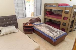 Casa c Wi-Fi, piscina e churrasqueira em Itanhaem