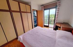 Apartments with parking space Rab - 22497