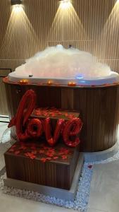 Mundarium - Chalés Temáticos com Hidromassagem e Cromoterapia