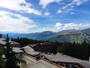 Résidence Belles Challes - Studio 4 personnes à Arc 1800 skis aux pieds et proche des commerces dans le village du Charvet MAE-1832