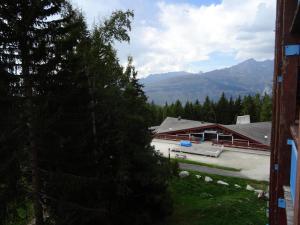 Résidence Belles Challes - Studio 4 personnes à Arc 1800 skis aux pieds et proche des commerces dans le village du Charvet MAE-2092