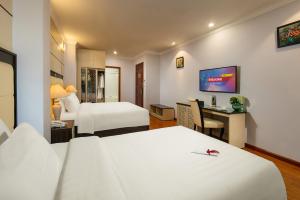Phòng Deluxe Giường Đôi/2 Giường Đơn Có Ban Công (Deluxe Double or Twin Room with Balcony)