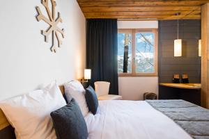 Hotels Marmotel & Spa : photos des chambres