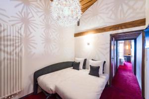 Hotels Marmotel & Spa : photos des chambres