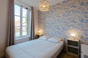 Appartements Le Cabourgeais centre ville : photos des chambres