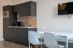 Appartements 1 bedroom apartment in city center with parking : photos des chambres