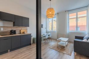 Appartements 1 bedroom apartment in city center with parking : photos des chambres