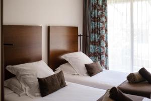 Villas Le Repertoire - Le Domaine aux Agasses : photos des chambres