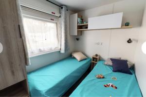Maisons de vacances Mobil-Home Camping 4* Landes Lac et Ocean 6 a 8 p. : photos des chambres