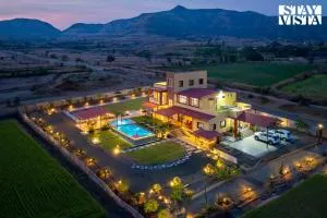 StayVista at Mangifera Agro Estate with Pool, Wi-Fi - Karandi Khurd