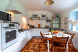Maisons de vacances Kerfeunteun - Grande maison a 15min de la plage : photos des chambres
