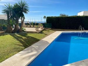 Seafront in Marbella with pool and garage