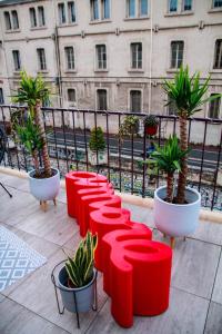 Appartements L'amoureux - terrasse et climatisation coeur de ville : photos des chambres