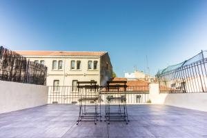 Appartements L'amoureux - terrasse et climatisation coeur de ville : photos des chambres