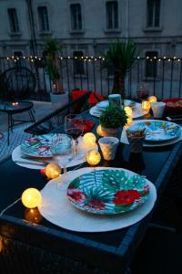 Appartements L'amoureux - terrasse et climatisation coeur de ville : photos des chambres