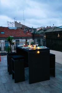 Appartements L'amoureux - terrasse et climatisation coeur de ville : photos des chambres