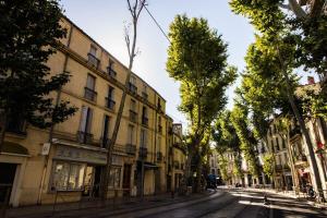 Appartements L'amoureux - terrasse et climatisation coeur de ville : photos des chambres