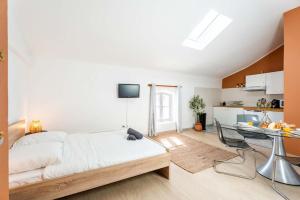 Appartements Studio Chaleureux niche au coeur des Salins : photos des chambres