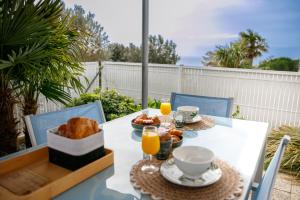 Maisons de vacances Jolie maisonnette vue mer : photos des chambres