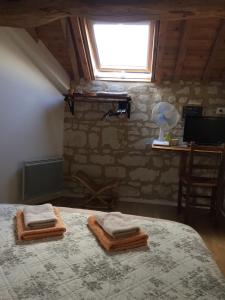 Maisons d'hotes Les Caves : photos des chambres