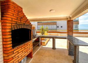 Apto com WiFi a 140 metros da Praia do Caicara SP