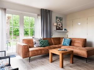 Bungalow in Friesland with Private Spa & Sloop