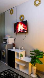 DefiniteHomes1 - Fully furnished studio with a rooftop restaurant near JKIA Airport, Downtown Nairobi