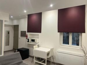 Appartements Le studio du centre : photos des chambres