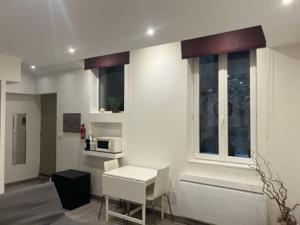 Appartements Le studio du centre : photos des chambres