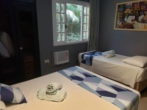 Amarilis Flat Maravilhoso - dentro de Riviera, com serviço de hotelaria, sauna e piscinas climatizadas