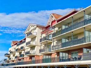 Appartements CAPTAL beau 2 pieces coeur de ville parking terrasse : photos des chambres