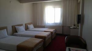 Quadruple Room with Mountain View room in Butik Ertur Hotel
