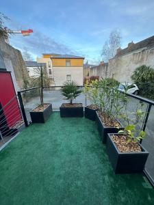Appartements Le Saint Symphorien : photos des chambres