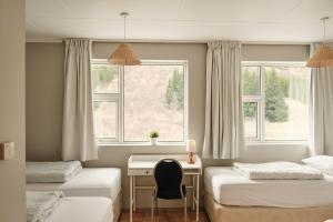 Standard Quadruple Room (4 Single beds) room in Laugarvatn Hostel