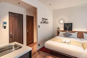 Apartment Hotel 11 Shinsaibashi Amemura