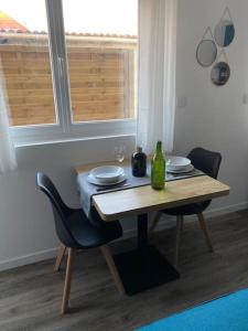 Appartements Studio neuf a Bouguenais+terrasse+parking : photos des chambres