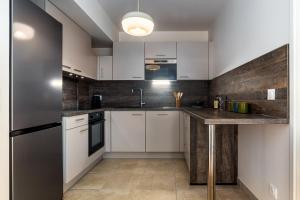 Appartements • Vue Panoramique • Gare a 10min • Parking Prive • : photos des chambres