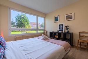 Appartements 2 BR apartment with parking, 5 minutes from Lille : photos des chambres