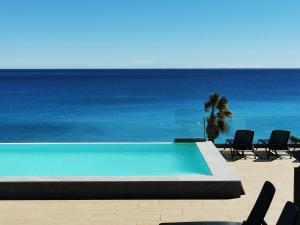 Appartements Pearl Beach - Rooftop Pool Seaside : photos des chambres