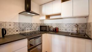 Appartements Home Chic Home - Les Toits de Sainte-Ursule : photos des chambres