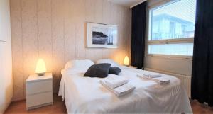 Kotimaailma Apartments - saunallinen kaksio koskinäkymällä - Verstaankatu