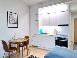 Kotimaailma Apartments - Moderni ydinkeskustan yksiö - Aleksanterinkatu