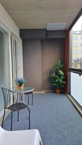 Kotimaailma Apartments - Parvekkeellinen keskustakaksio - Aleksanterinkatu