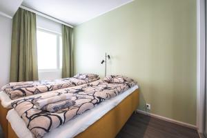 Saunallinen kaksio autohallipaikalla