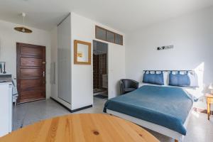 Appartements 1 - Studio au coeur du village : photos des chambres